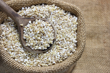 Pearl barley in canvas sack