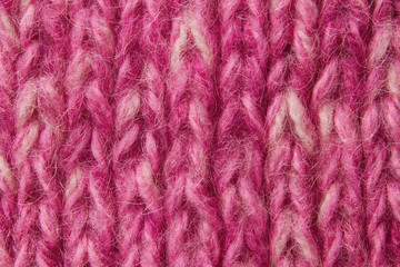woolen texture background, knitted wool fabric, pink fluffy