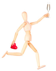 wooden Dummy with champagne holding red heart