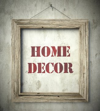 Home decor emblem in old wooden frame