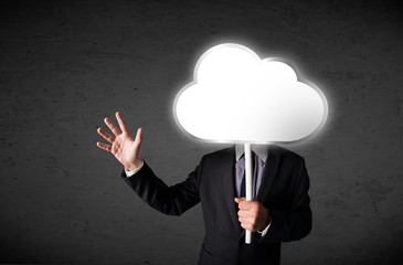 Businessman holding a cloud