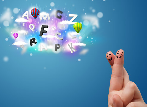 Happy smiley fingers looking at colorful magical clouds and ball