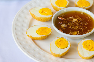 Boiled eggs fried with a sweet sauce
