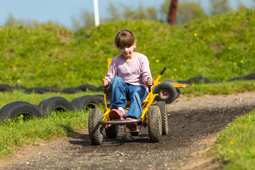 Girl driving buggy cart