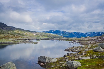 Fototapeta na wymiar Norway Mountain Vibrant Landscape Trolltunga Odda Fjord Norge Hi