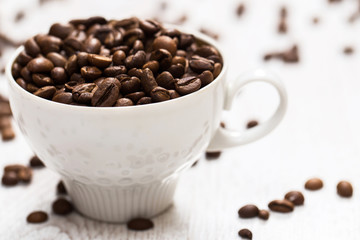 Cup and coffee beans