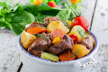 goulash meat with vegetables and potatoes