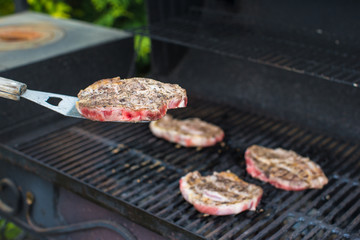 Fresh juicy meat on an open barbecue