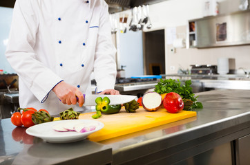 Chef cooking in his kitchen