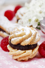 Cakes filled with raspberry jam