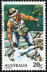 stamp printed in Australia shows Trout Fishing