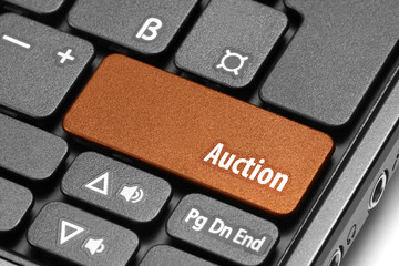 Auction. Orange hot key on computer keyboard