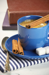 Cup of coffee and books