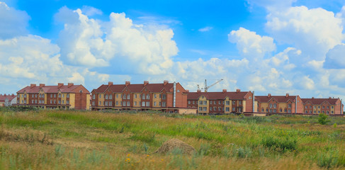 Fototapeta na wymiar construction of new houses in the field
