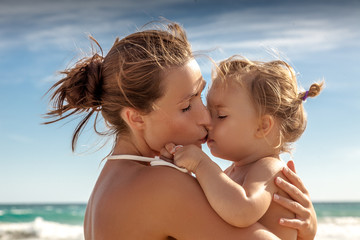 Naklejka premium summer beach mother baby