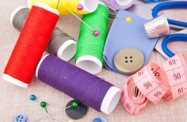Tools for needlework, thread, scissors, pins, measure type and