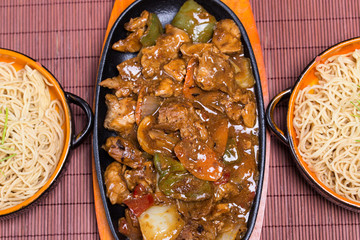 Pork in black bean souse with green pepper and onion