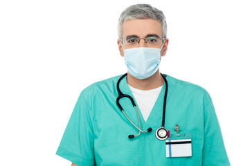 Young doctor in protective medical mask