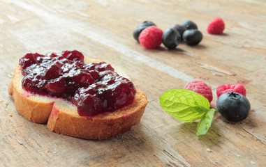 Toasted baguette with sweet raspberry jam