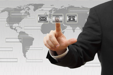 Businessman pressing virtual ( mail,phone,email ) buttons. Conta