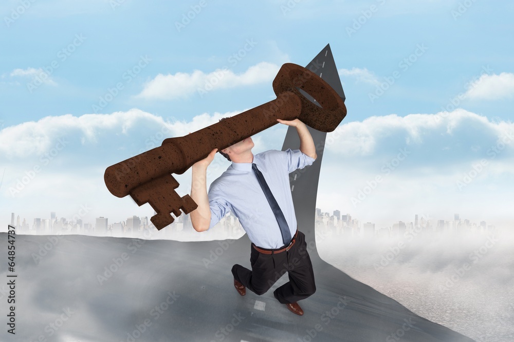 Poster composite image of businessman carrying large key