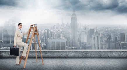 Composite image of businesswoman climbing career ladder with bri - Powered by Adobe