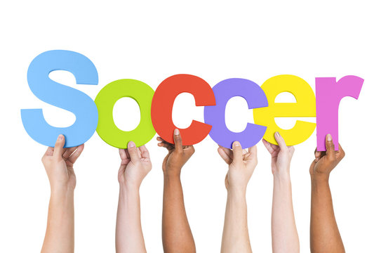 Multiethnic Arms Raised Holding Text Soccer