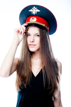 young and beautiful woman in police uniform