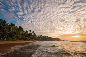 Sunrise at tropical beach of Sri Lanka