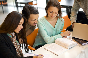 Group of students studying in a library