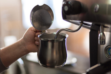 barman prepares milk