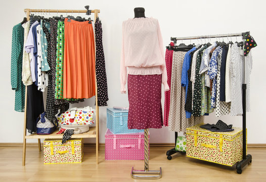 Wardrobe with polka dots clothes and accessories,outfit on dummy