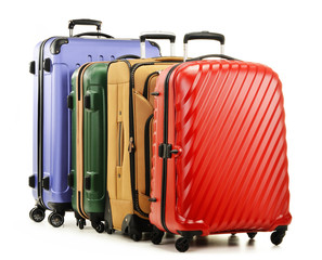 Four suitcases isolated on white background