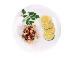 Fresh unshelled boiled shrimps with spaghetti.