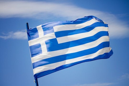 Greek flag in the blue sky