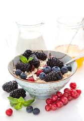 Healthy breakfast with granola and fresh berries