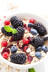 Healthy breakfast with granola and fresh berries