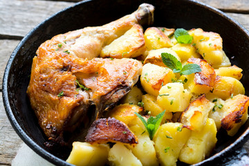 Chicken leg and potato