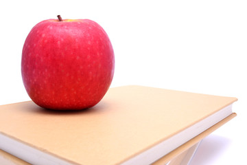 Books and apple