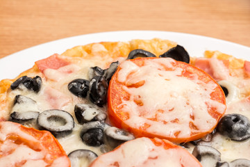 Traditional Italian Pizza On Plate Close Up