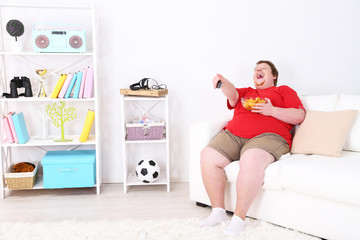 Lazy overweight male sitting