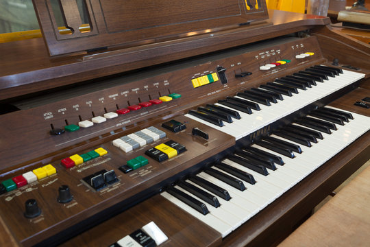 Antique piano keys and wood grain