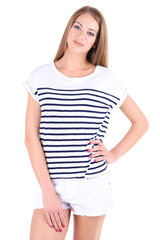 Obraz premium Beautiful young girl shorts and t-shirt isolated on white