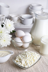 Still life with tasty dairy products on table