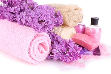 Obraz na płótnie Canvas Composition with spa treatment, towels and lilac flowers,