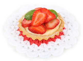 Tasty tartlet with strawberries isolated on white