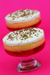 Strawberry trifle on pink background
