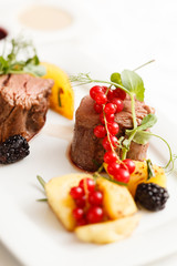 steak with fresh berries