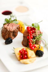 steak with fresh berries