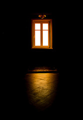 Black room, mysterious window light